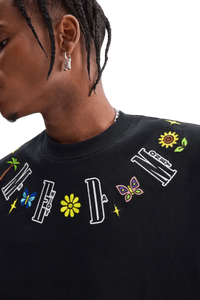 Close-up of black MEDM Butterfly Necklace Embroidery Tee by Mr Enjoy Da Money with colorful embroidered letters and butterfly design
