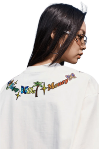 Back view of model wearing white MEDM Butterfly Necklace Embroidery Tee by Mr Enjoy Da Money with colorful embroidered design