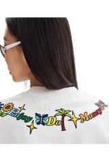 Back view of MEDM Butterfly Necklace Embroidery Tee by Mr Enjoy Da Money with colorful butterfly and palm tree embroidery