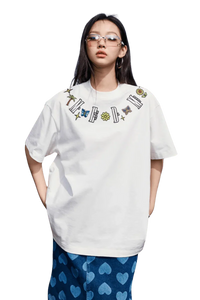 White MEDM Butterfly Necklace Embroidery Tee by Mr Enjoy Da Money worn with blue heart patterned pants