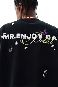 Black MEDM Falling Petals Embroidery Tee by Mr Enjoy Da Money with white petals and purple butterfly design on back