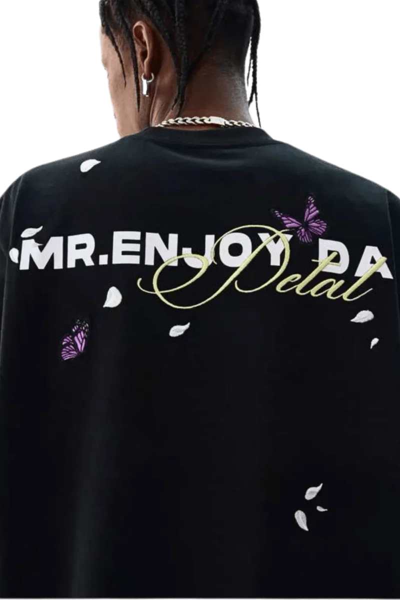 Black MEDM Falling Petals Embroidery Tee by Mr Enjoy Da Money with white petals and purple butterfly design on back
