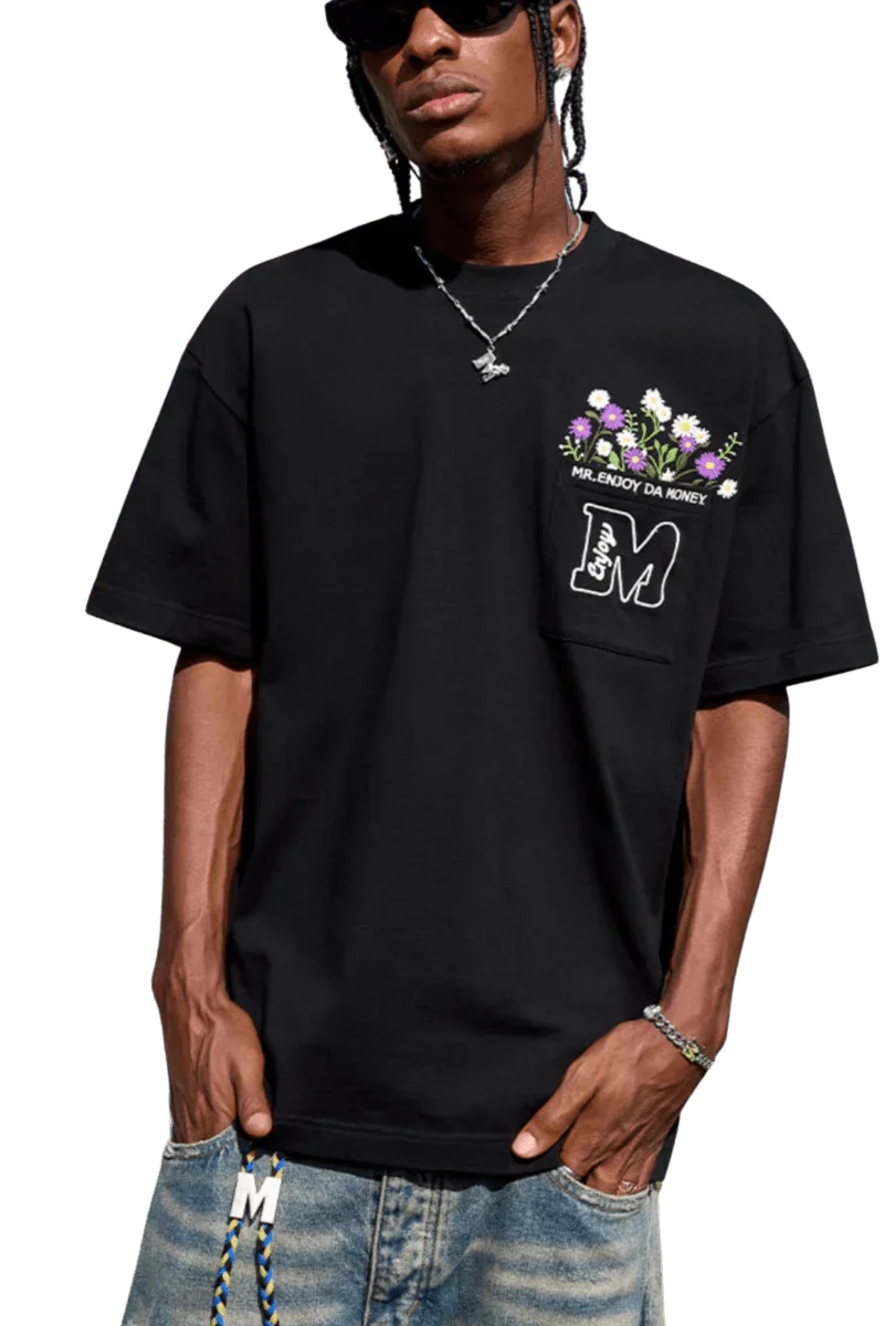 Black MEDM Flower Embroidery Pocket Tee featuring floral design on chest for casual style