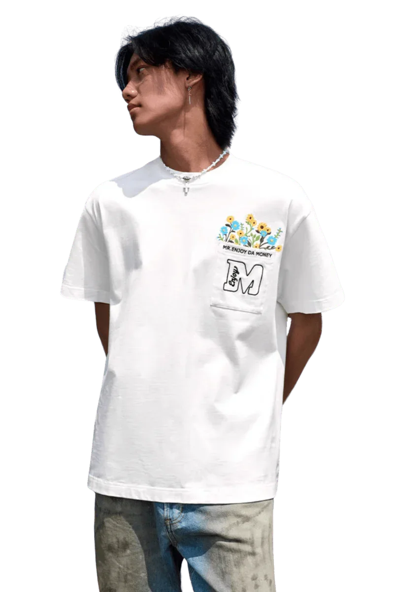 MEDM Flower Embroidery Pocket Tee in white featuring vibrant floral design and front pocket