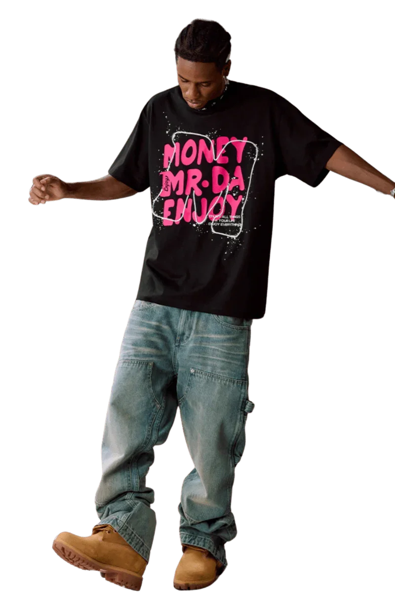 Model wearing MEDM Large M WireFrame Embroidery Tee in black with vibrant graphic design