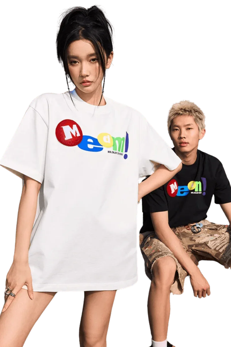 Mr Enjoy Da Money MEDM M&M'S Print Tee in white and black showcasing oversized style and vibrant colors