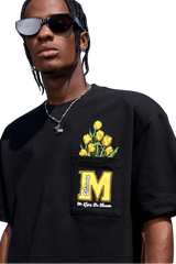 Black MEDM Pixelated Flower Pocket Tee by Mr Enjoy Da Money with yellow pixelated flower design and branded pocket