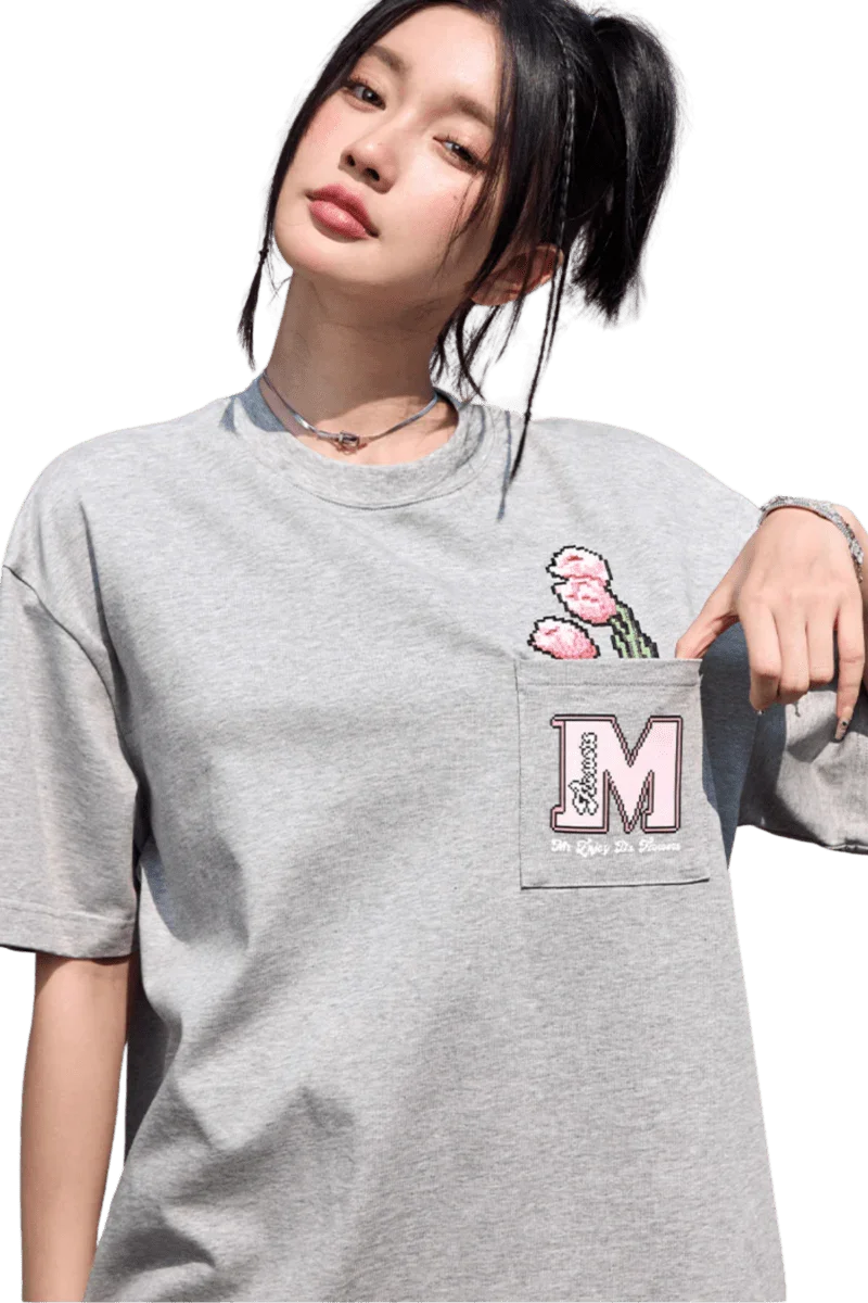 MEDM Pixelated Flower Pocket Tee by Mr Enjoy Da Money in light gray with pixelated flower design on the chest pocket