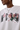 MEDM Rose Butterfly Embroidery Tee featuring vibrant floral designs on a white shirt