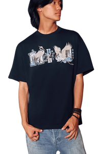 Model wearing MEDM SS24 Phoenix Embroidery Tee in black featuring vibrant embroidery design