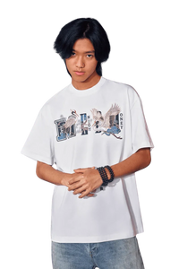 Model wearing MEDM SS24 Phoenix Embroidery Tee featuring detailed bird graphics and a relaxed fit