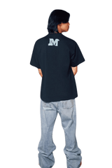 MEDM SS24 Phoenix Series Print Tee in black showcased on a model from the back
