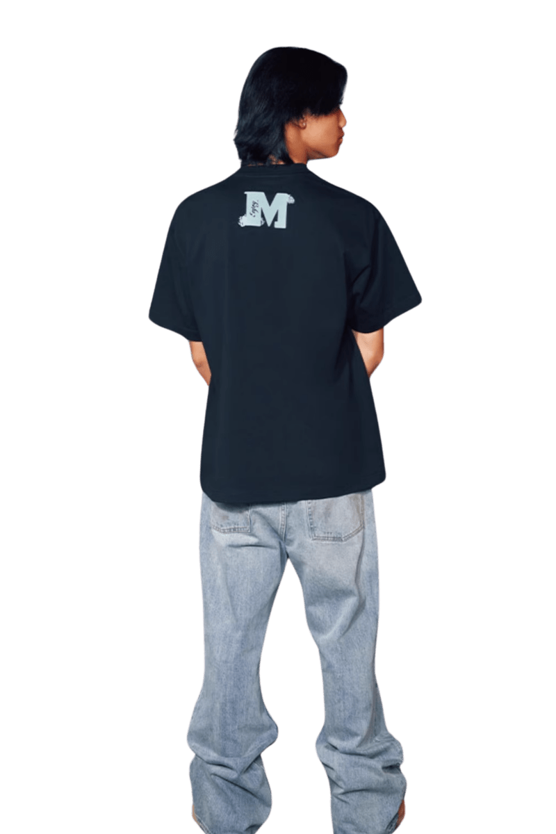 MEDM SS24 Phoenix Series Print Tee in black showcased on a model from the back