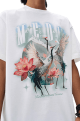 MEDM SS24 Phoenix Series Print Tee featuring vibrant crane and flower graphics on a white shirt