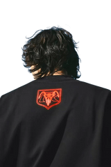MEDM SS24 x Karmen Rider Tee featuring a bold logo print on the back of a black t-shirt
