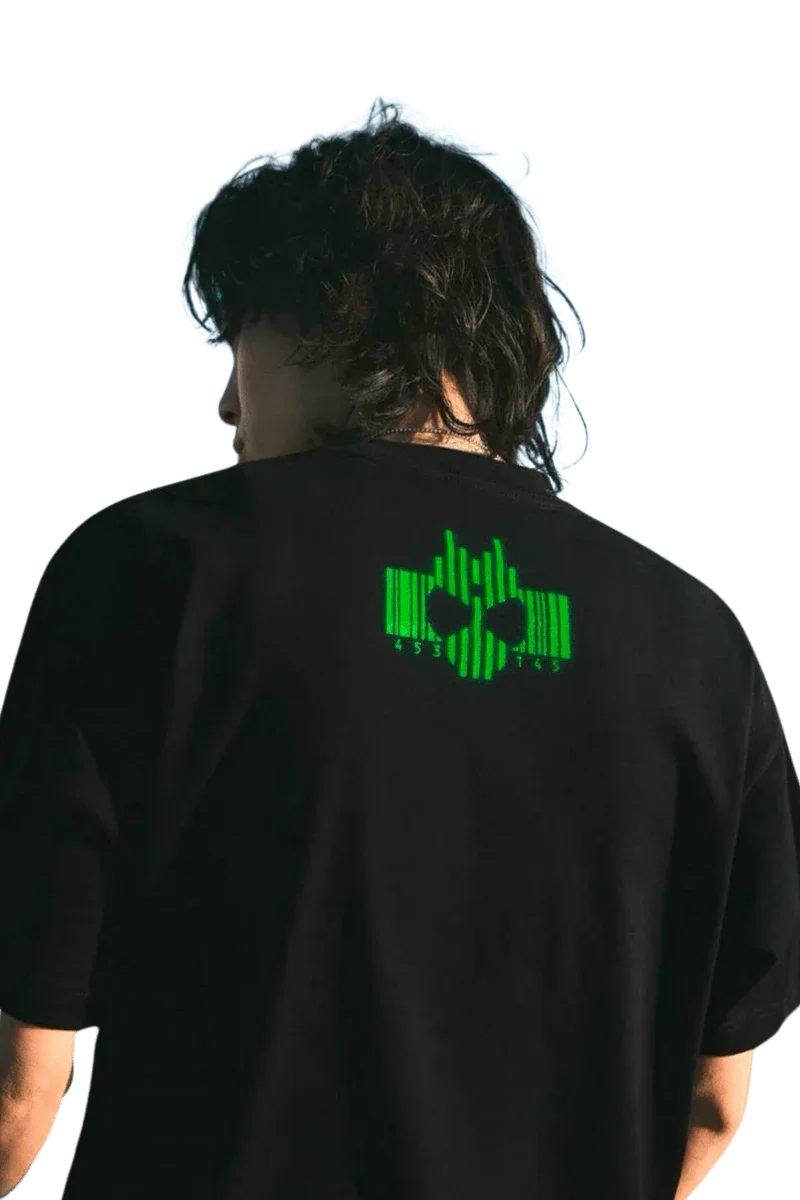 Back view of black MEDM SS24 x Karmen Rider Tee with glowing graphic design