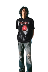 MEDM SS24 x Karmen Rider Tee in black with bold graphic design worn by a model