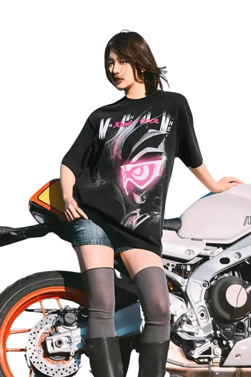 Stylish MEDM SS24 x Karmen Rider Tee showcased on a model beside a motorcycle