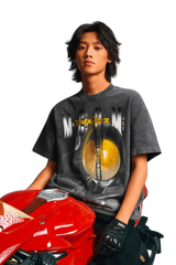 Stylish MEDM SS24 x Karmen Rider Tee featuring bold graphics and a relaxed fit on a model with a motorcycle