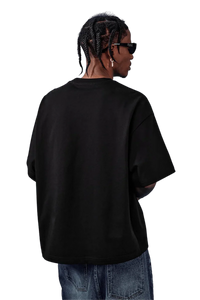 Back view of a black MEDM SS25 Basic Embroidery Tee showcasing a relaxed fit and stylish design