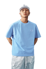 Light blue MEDM SS25 Basic Embroidery Tee showcasing a casual style for everyday wear
