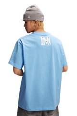 Stylish blue MEDM SS25 Basic Gem Series Tee featuring a unique logo design on the back
