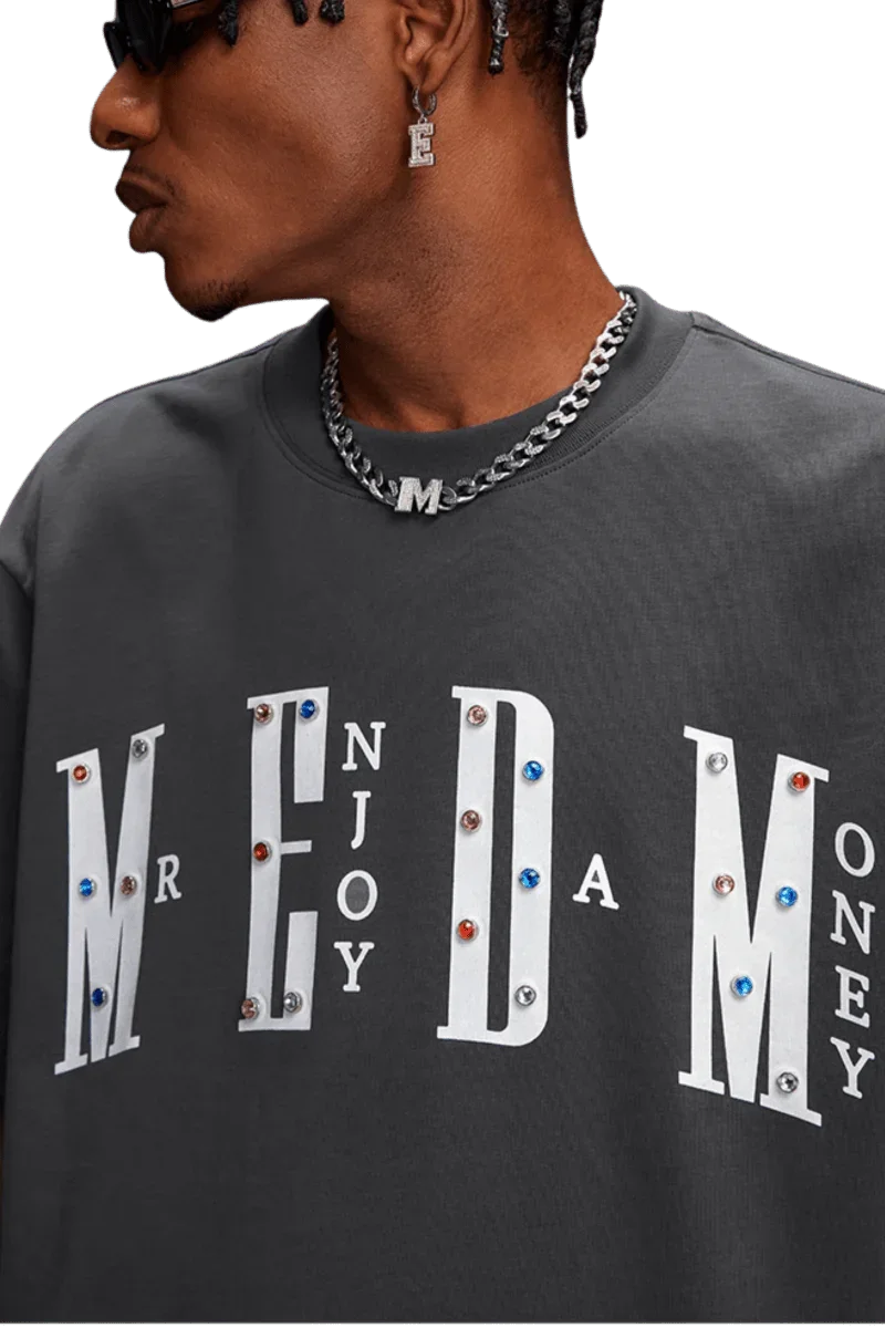 Stylish MEDM SS25 Basic Gem Series Tee featuring embellished lettering for a trendy look
