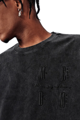 MEDM SS25 Basic Logo Washed Tee in black with embroidered logo detail on the front