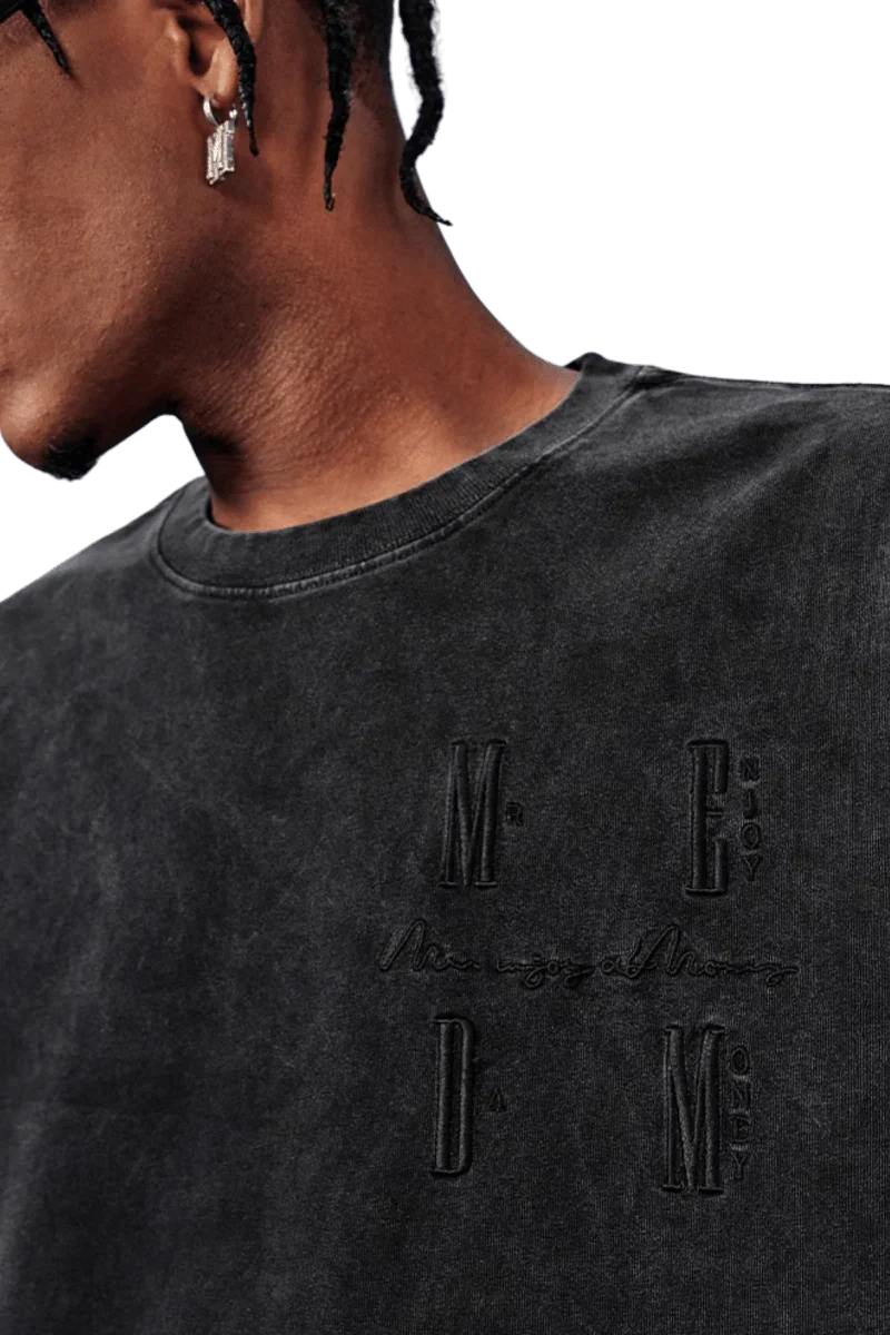 MEDM SS25 Basic Logo Washed Tee in black with embroidered logo detail on the front