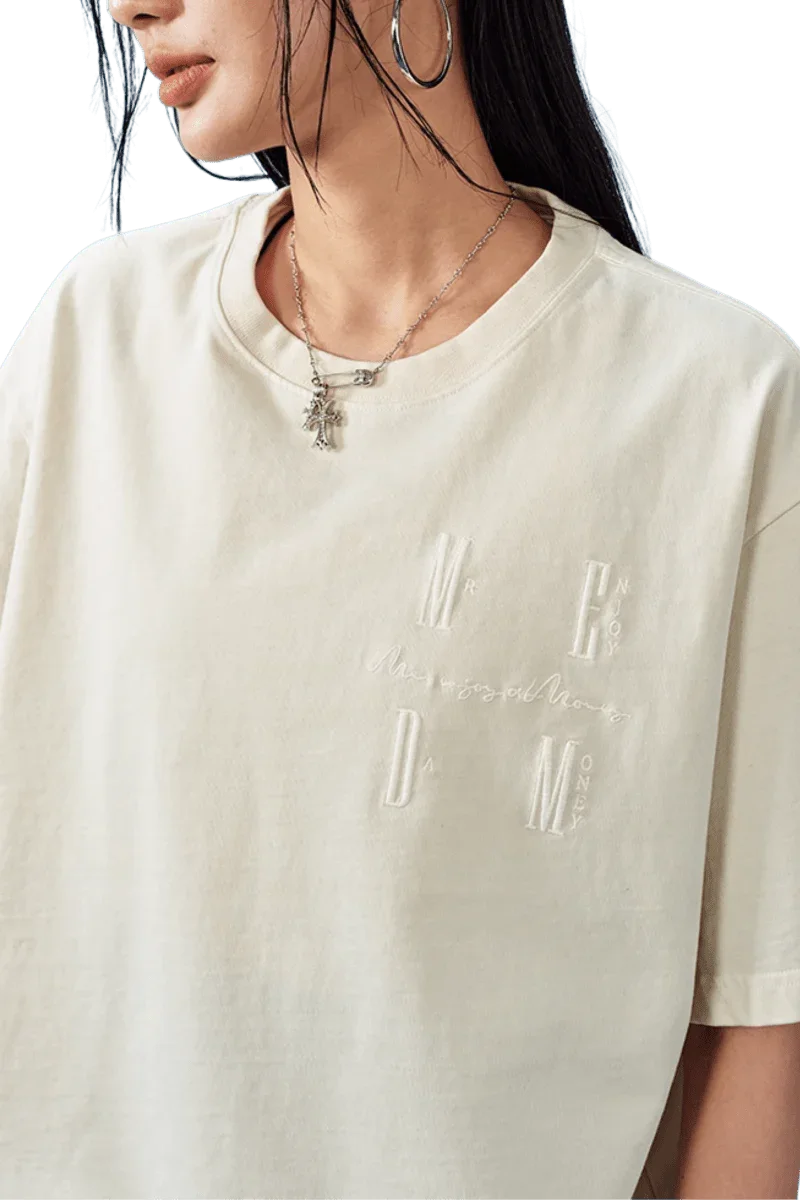 MEDM SS25 Basic Logo Washed Tee in cream color featuring embroidered logo detail on the chest