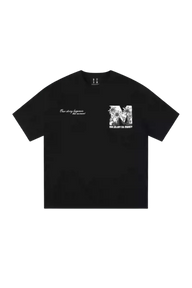 MEDM SS25 Big M Daisy Print Tee in black featuring a unique graphic design on the chest