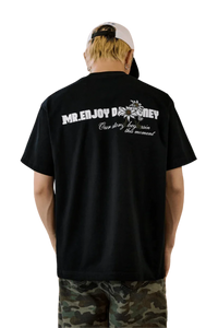 MEDM SS25 Big M Daisy Print Tee in black featuring logo on the back for casual streetwear style