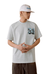 MEDM SS25 Big M Daisy Print Tee in Grey with Colorful Front Graphic for Casual Style