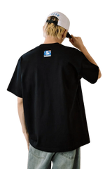 Back view of MEDM SS25 Cat Velcro Embroidery Tee in black worn by a model