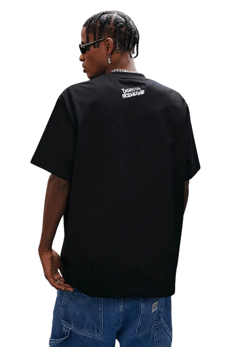 Back view of MEDM SS25 Dog Polaroid Tee in black, showcasing a relaxed fit and eye-catching graphic design