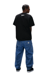 MEDM SS25 Dog Polaroid Tee in black worn with oversized denim pants for a trendy streetwear look