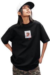 MEDM SS25 Dog Polaroid Tee in black featuring a fun dog graphic and relaxed fit for casual style
