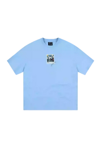 MEDM SS25 Dog Polaroid Tee in light blue with a unique graphic print on the front