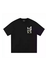 Black MEDM SS25 Floral Embroidery Tee with vibrant flower design on the chest