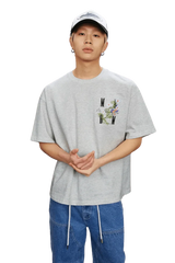 MEDM SS25 Floral Embroidery Tee in Gray featuring logo and colorful embroidery detail
