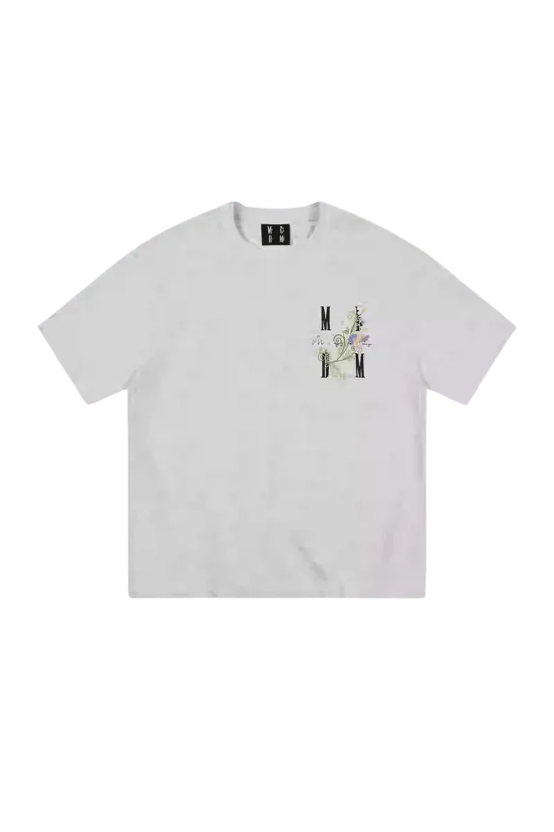 MEDM SS25 Floral Embroidery Tee in white with vibrant floral design on the chest area