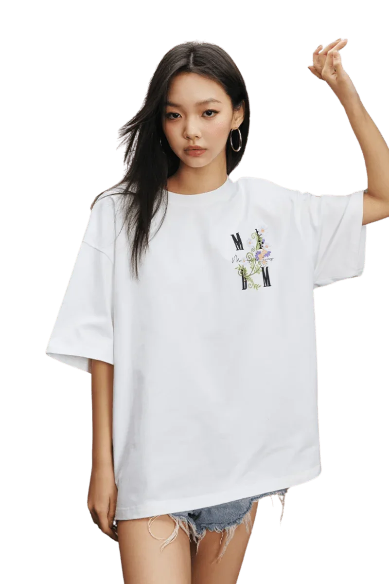 MEDM SS25 Floral Embroidery Tee in White with oversized fit and stylish floral design