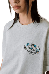 MEDM SS25 Floral Felt Embossed Tee in grey with stylish graphic design for casual wear