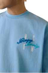 MEDM SS25 Four Color Velvet Embossed Tee in Blue with stylish logo detail