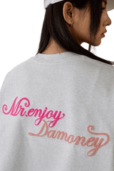MEDM SS25 Four Color Velvet Embossed Tee featuring a stylish logo on the back in gray fabric
