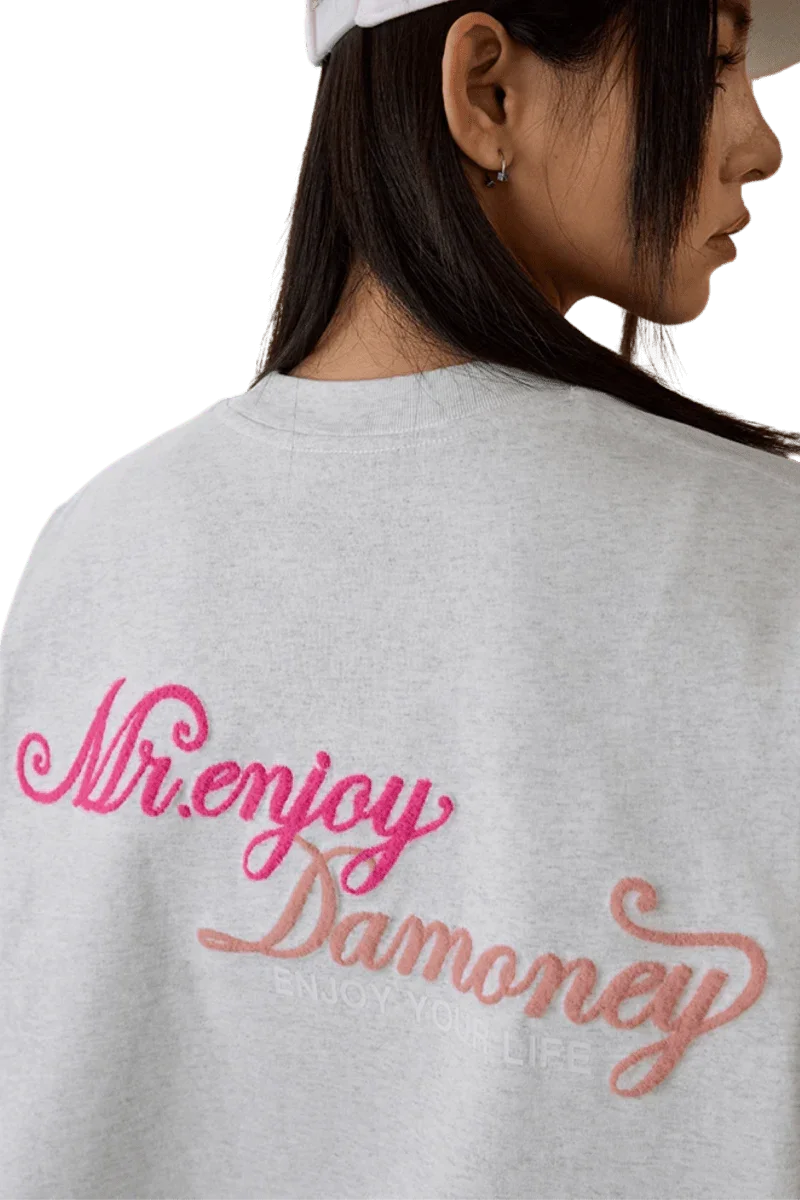 MEDM SS25 Four Color Velvet Embossed Tee featuring a stylish logo on the back in gray fabric