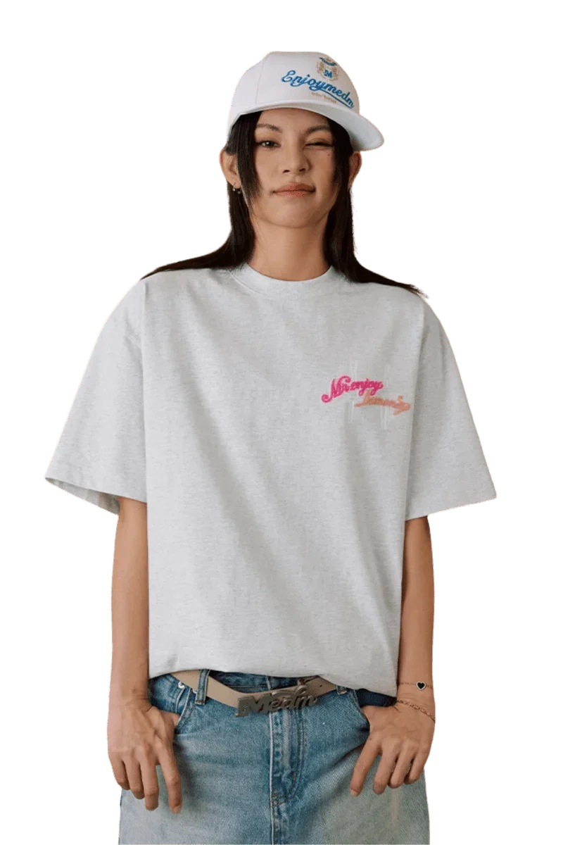 MEDM SS25 Four Color Velvet Embossed Tee displayed on a model with a relaxed fit and vibrant branding