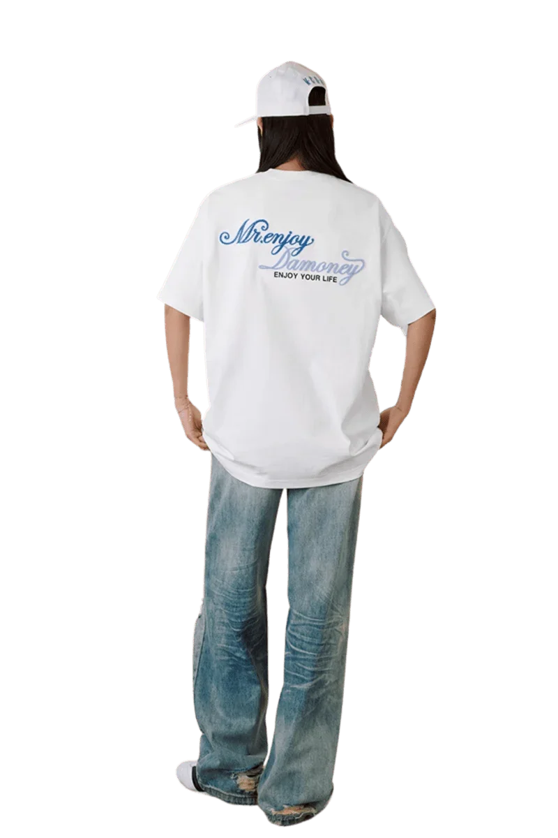 MEDM SS25 Four Color Velvet Embossed Tee in white with graphic logo on the back for casual wear