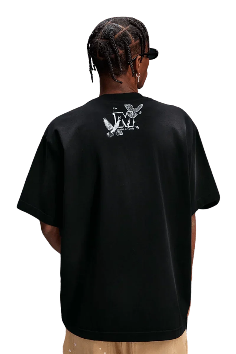 MEDM SS25 Lace Pigeon Gem Tee in black with unique back design for stylish streetwear