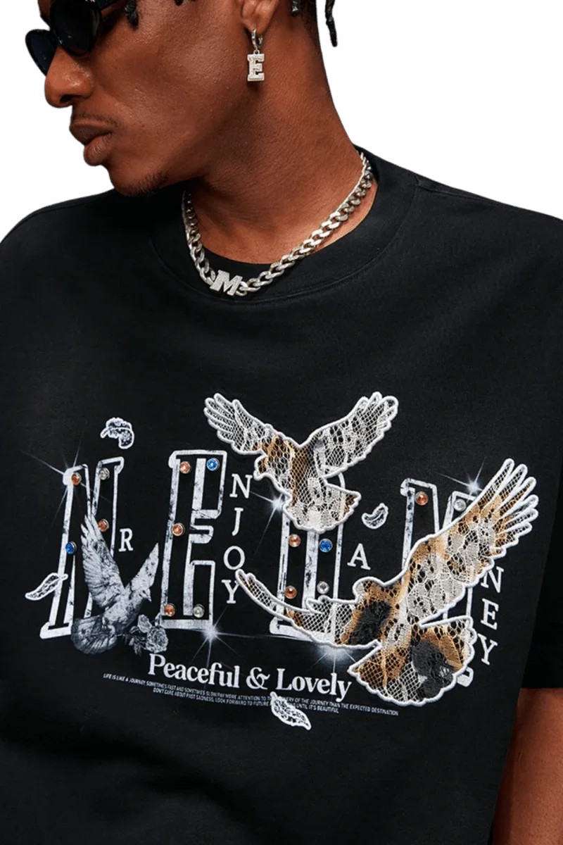MEDM SS25 Lace Pigeon Gem Tee in black featuring graphic design and unique embellishments